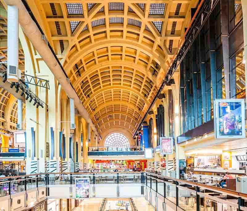 Abasto Shopping, Buenos Aires: Art deco architecture of a former market, now a bustling shopping center with a lively vibe.