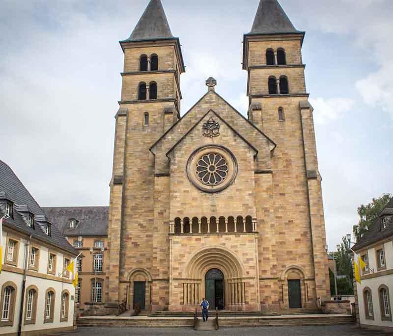 Abbey of Echternach, a historic abbey founded by Saint Willibrord, known for its impressive architecture and cultural events.