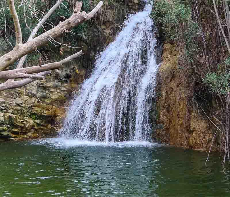 Adonis Baths Waterfalls, a picturesque natural site near Paphos, featuring waterfalls, pools, and mythological significance.