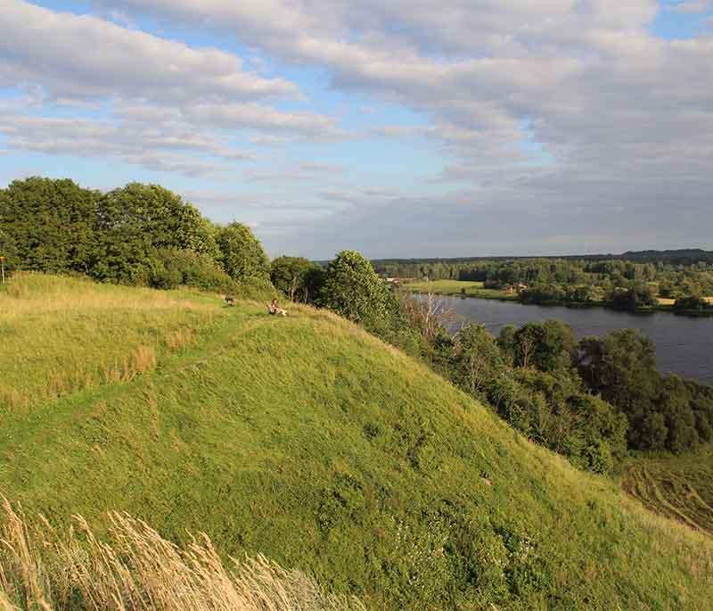 Aizkraukle Castle Mounds: Ruins of a medieval castle offering historical insights and panoramic views.