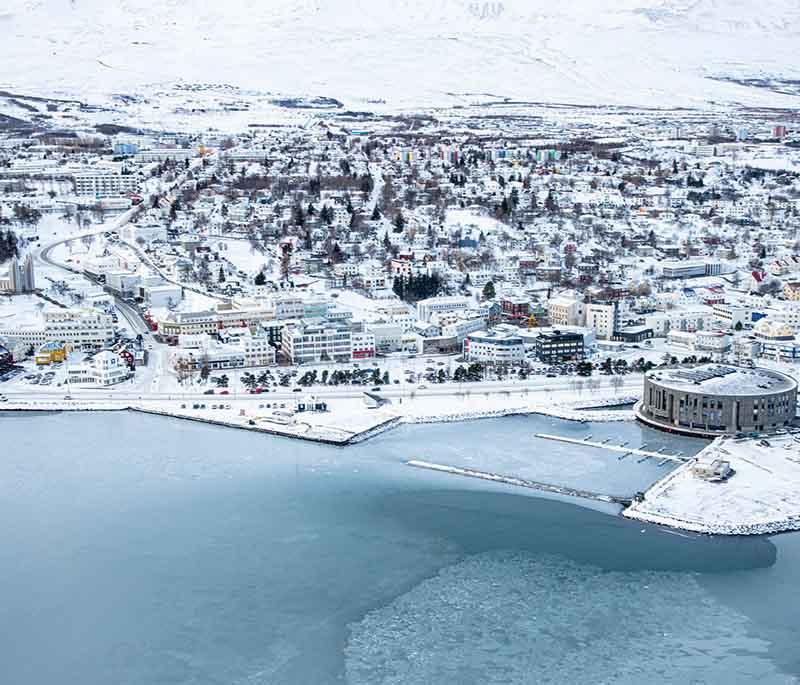 Akureyri, a town in northern Iceland, known for its botanical garden, culture, and nearby attractions.