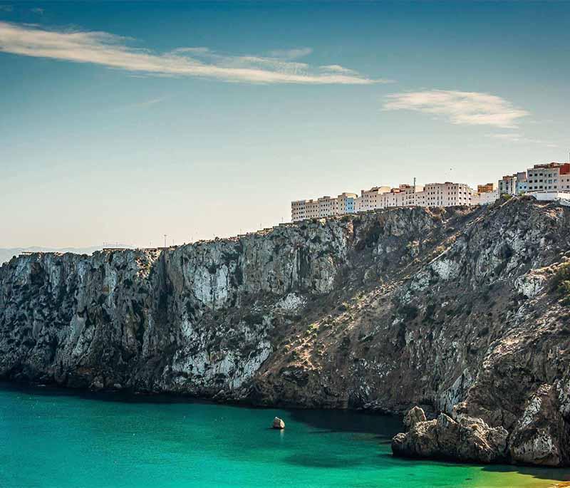 Al Hoceima - Coastal Paradise: Offers beautiful beaches, crystal-clear waters, and rugged mountain scenery.