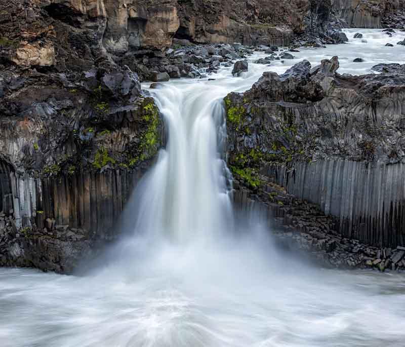 Aldeyjarfoss Waterfall, a stunning waterfall in northern Iceland, known for its basalt column formations.