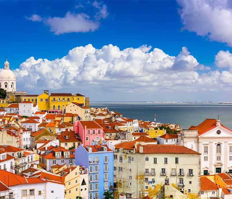 Alfama District - Lisbon’s oldest neighborhood, famous for its winding streets, Fado music, and historic landmarks.