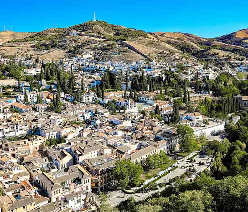 Alhambra (Granada) - A magnificent palace and fortress complex known for its stunning Islamic architecture and gardens.