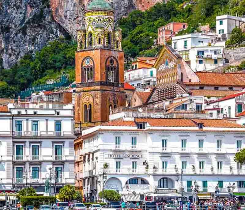 Amalfi Coast, Campania, a stunning coastline known for its cliffs, picturesque towns, and crystal-clear waters.