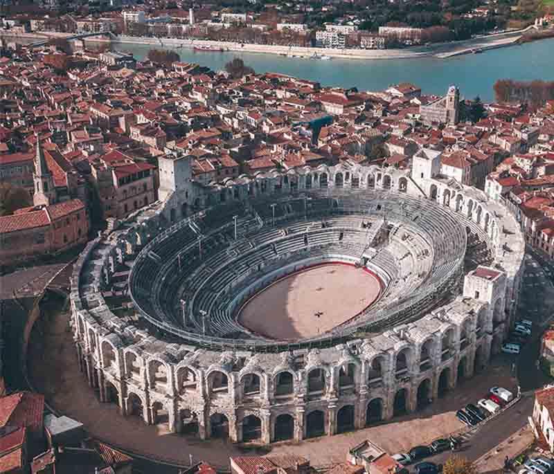 Arles Amphitheatre, Arles, a well-preserved Roman arena that still hosts events, reflecting the city's rich ancient history.