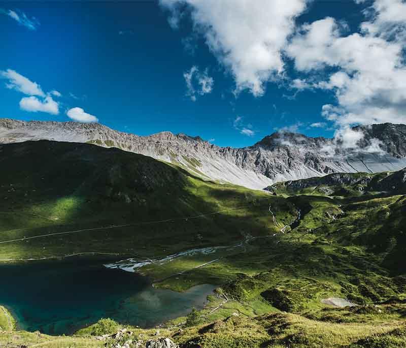 Arosa - A mountain resort town known for skiing, hiking, the scenic Arosa Line train, and alpine beauty.