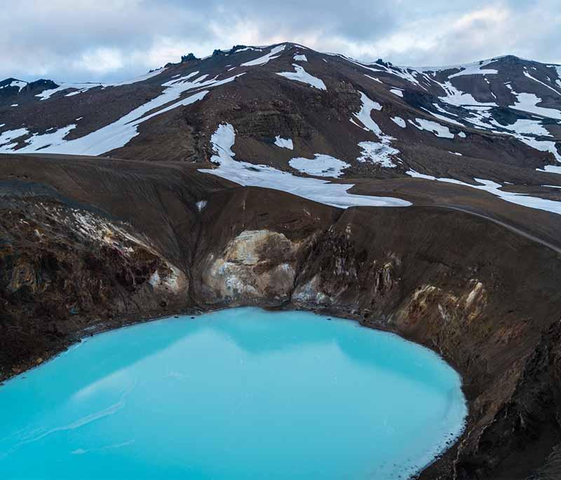 Askja Caldera, a remote volcanic area in the highlands, featuring a caldera with a beautiful geothermal lake.