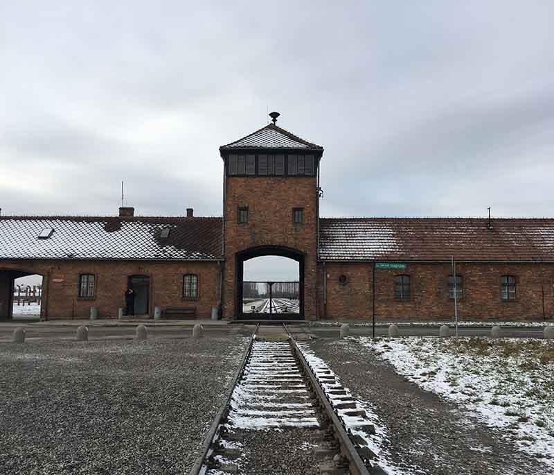Auschwitz-Birkenau Memorial and Museum - Holocaust memorial site preserving the history of World War II atrocities.