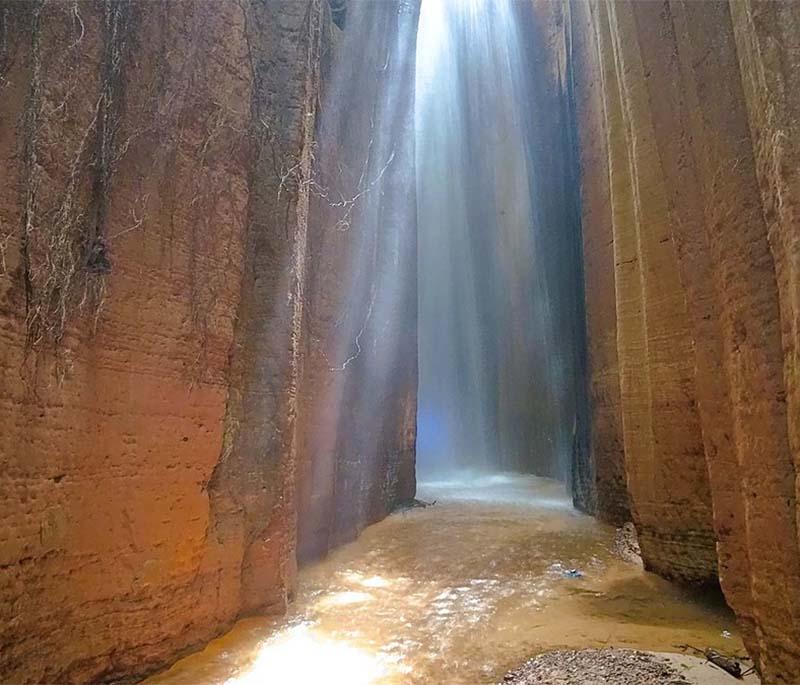 Awhum Waterfall - A breathtaking waterfall in Enugu, known for its serene environment and religious significance.