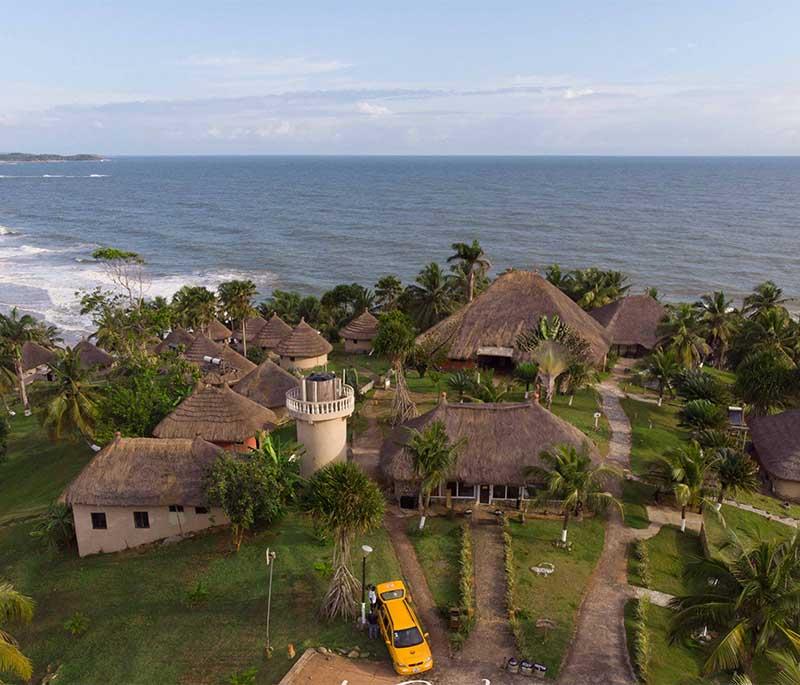 Axim Beach Resort, offering beautiful beaches, water activities, and comfortable accommodations on Ghana's western coast.