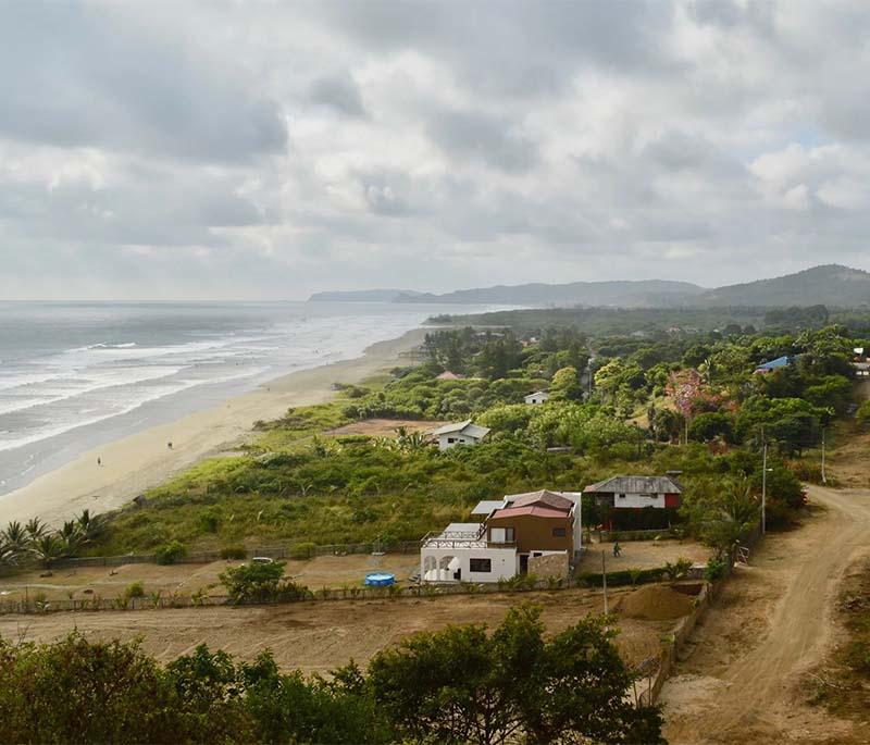 Ayampe Beach, a tranquil beach destination known for its natural beauty, surfing, and eco-friendly accommodations.