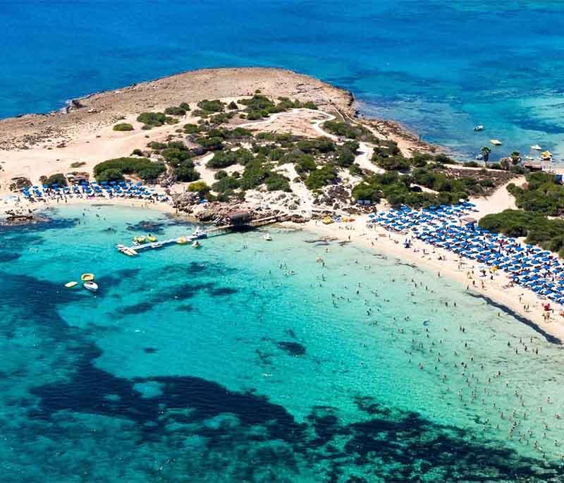 Ayia Napa Beaches, known for white sands, crystal-clear waters, and lively nightlife, making it a popular tourist destination