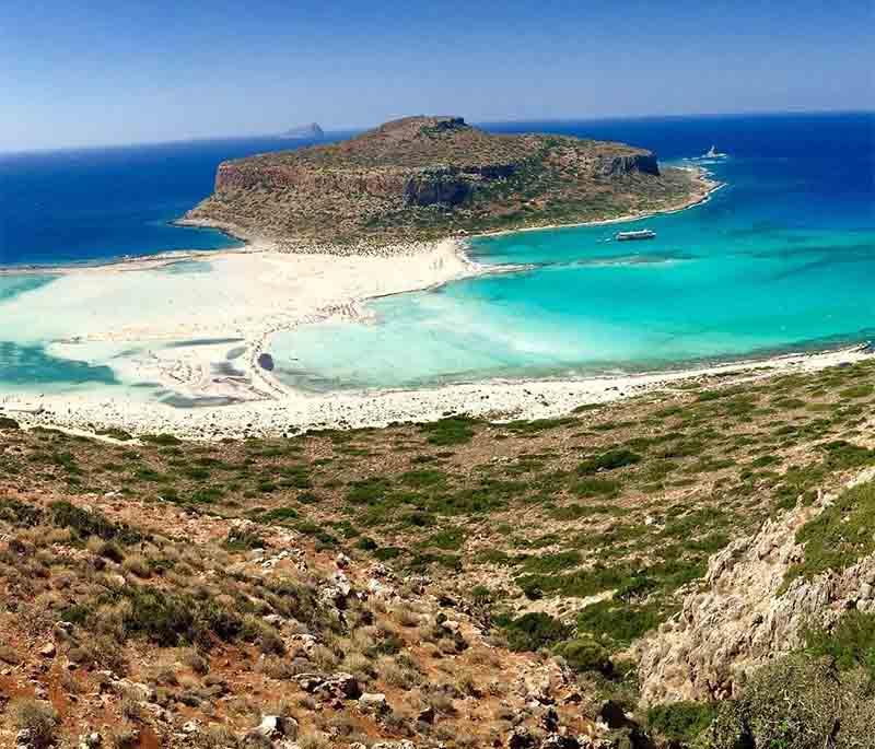 Balos Beach, a stunning lagoon on the island of Crete, known for its crystal-clear waters and beautiful scenery.