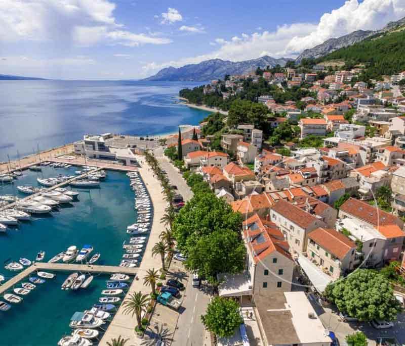 Baska Voda, a popular seaside resort with beautiful beaches, crystal-clear waters, and a lively promenade.