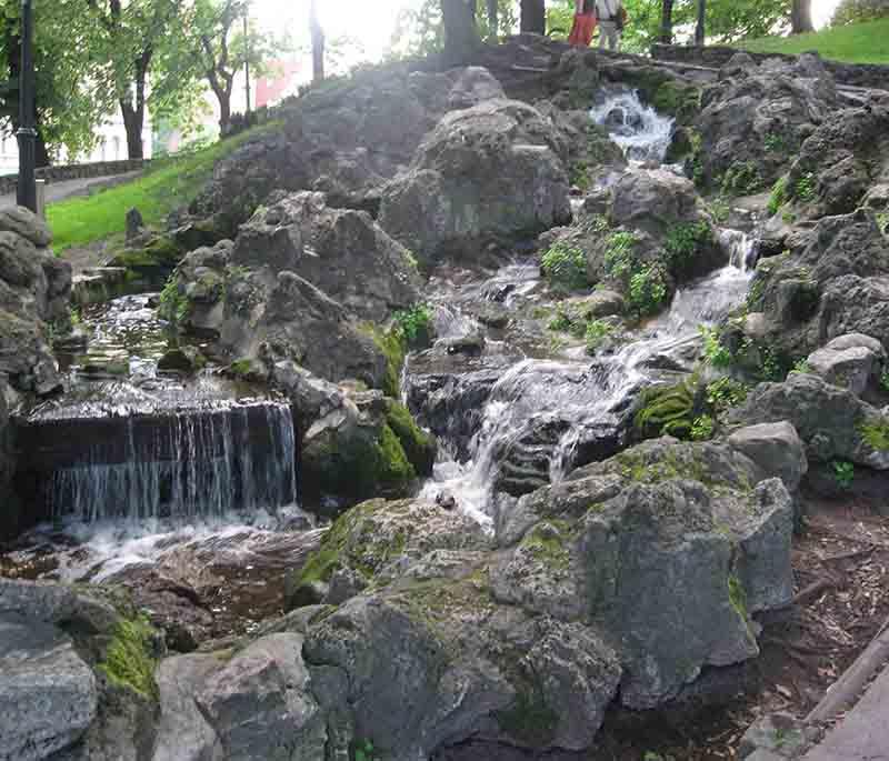 Bastejkalns Park in Riga, a beautiful park in the city center, offering green spaces, walking paths, and historic monuments.