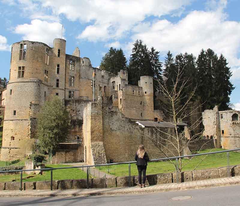 Beaufort Castle, a historic castle in the Mullerthal Region, featuring both medieval and Renaissance architecture.