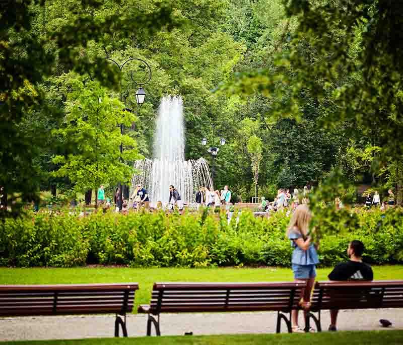 Bernardine Garden, a picturesque park in Vilnius, offering beautiful gardens, walking paths, and views of the Vilnia River.