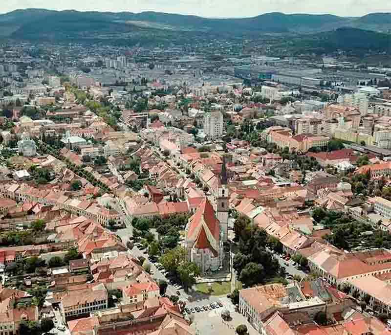 Bistrița - A charming town with a well-preserved medieval center, colorful buildings, and historic churches.