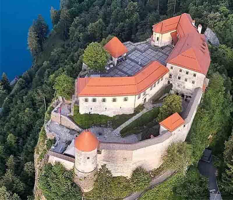 Bled Castle - A medieval castle perched on a cliff above Lake Bled, offering historical exhibits and panoramic views.