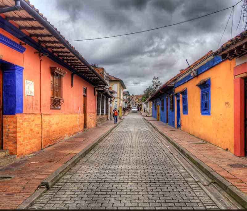 Bogotá's La Candelaria, the historic heart of the capital, with cobblestone streets, colonial buildings, and landmarks.