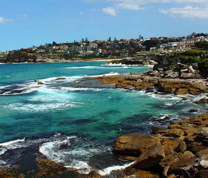 Bondi Beach in Sydney, New South Wales, is famous for its vibrant beach culture, surfing spots, and lively coastal vibes.