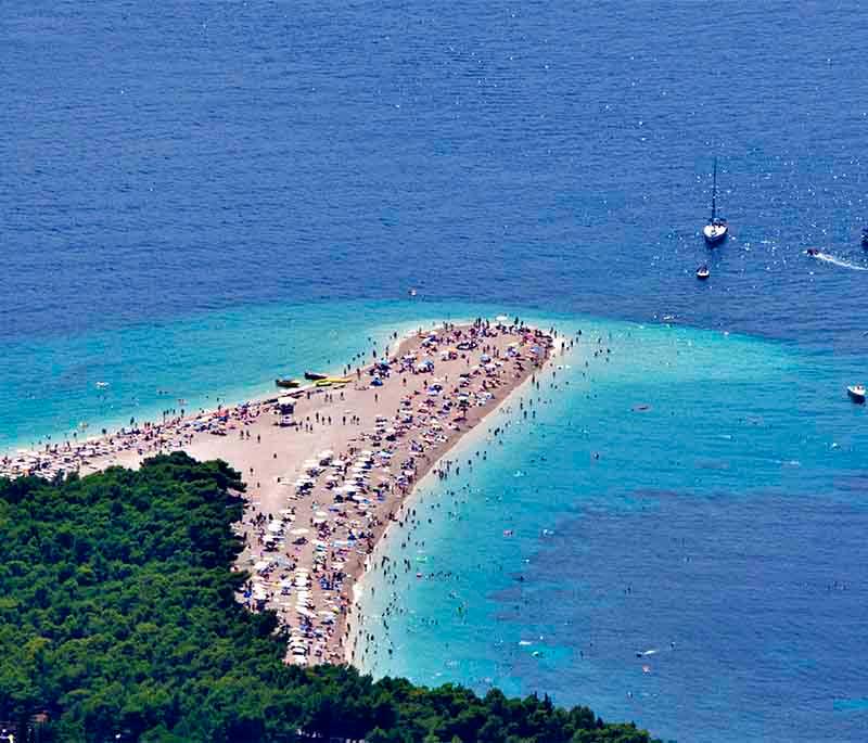 Brac Island, famous for its white-pebble beach Zlatni Rat, the historic town of Supetar, and scenic surroundings.