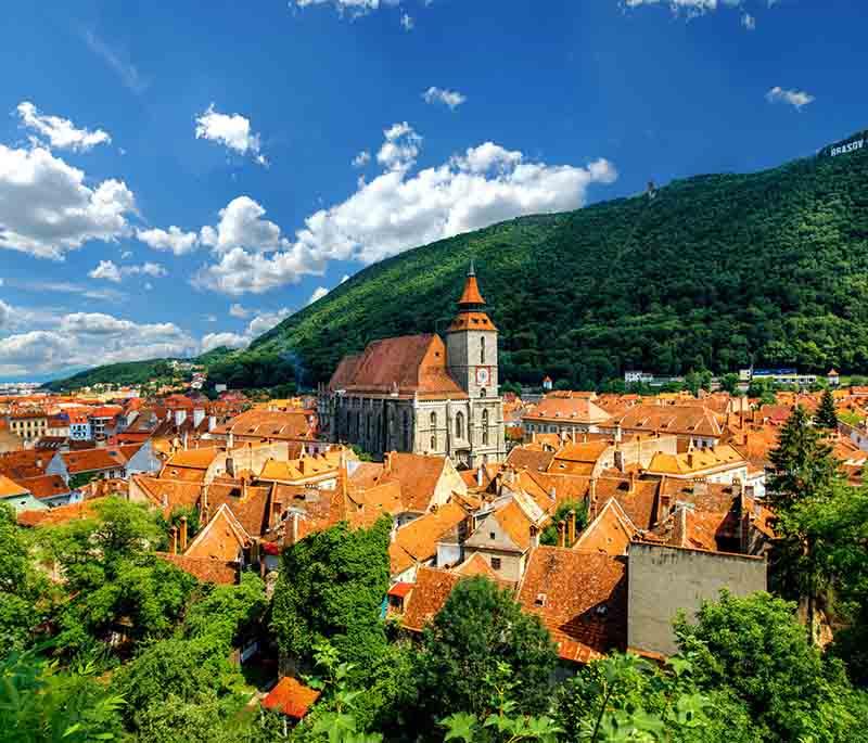 Brasov - A charming city nestled in the Carpathian Mountains, known for its medieval Saxon walls and the Black Church.