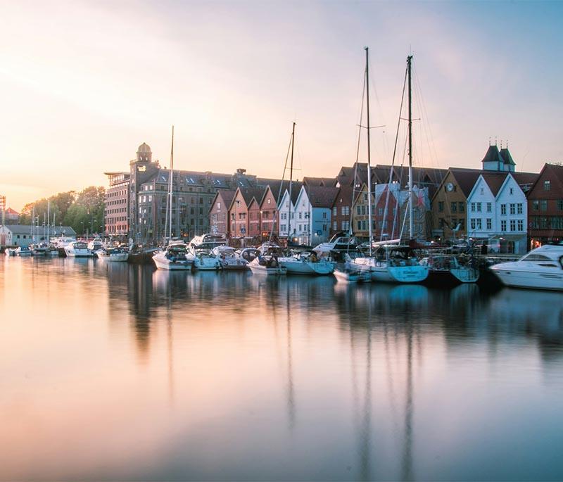 Bryggen, Bergen - A historic wharf with colorful wooden buildings, a UNESCO World Heritage site, and cultural significance.