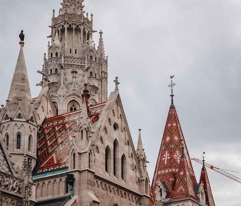 Budapest - Matthias Church, a historic church with a colorful tile roof, known for its Gothic architecture.