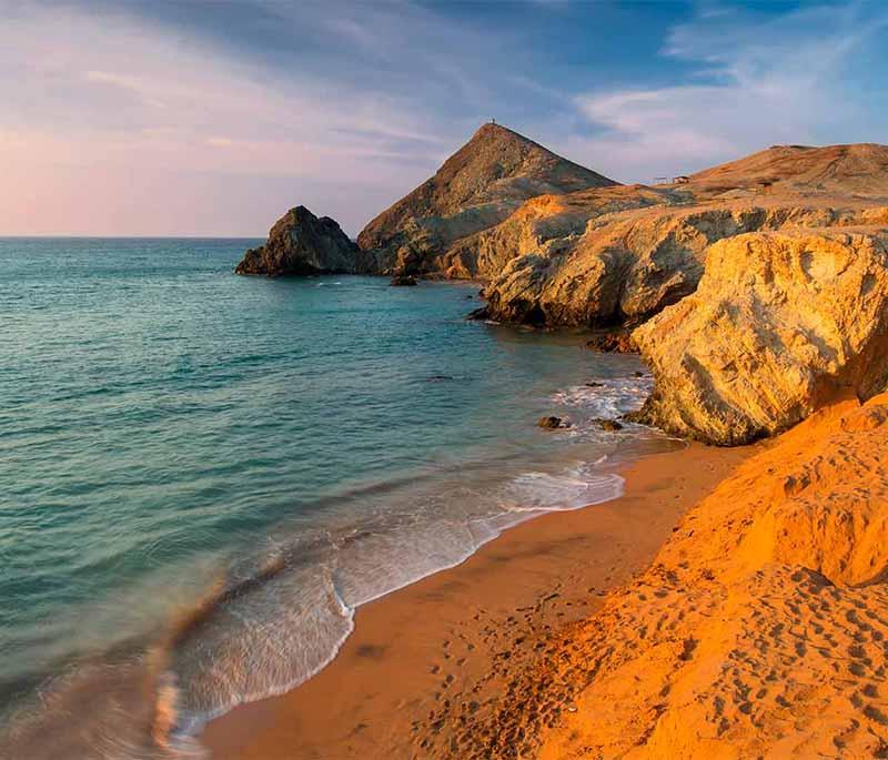 Cabo de la Vela, a remote desert destination known for its stunning coastline, Wayuu culture, and beautiful sunsets.