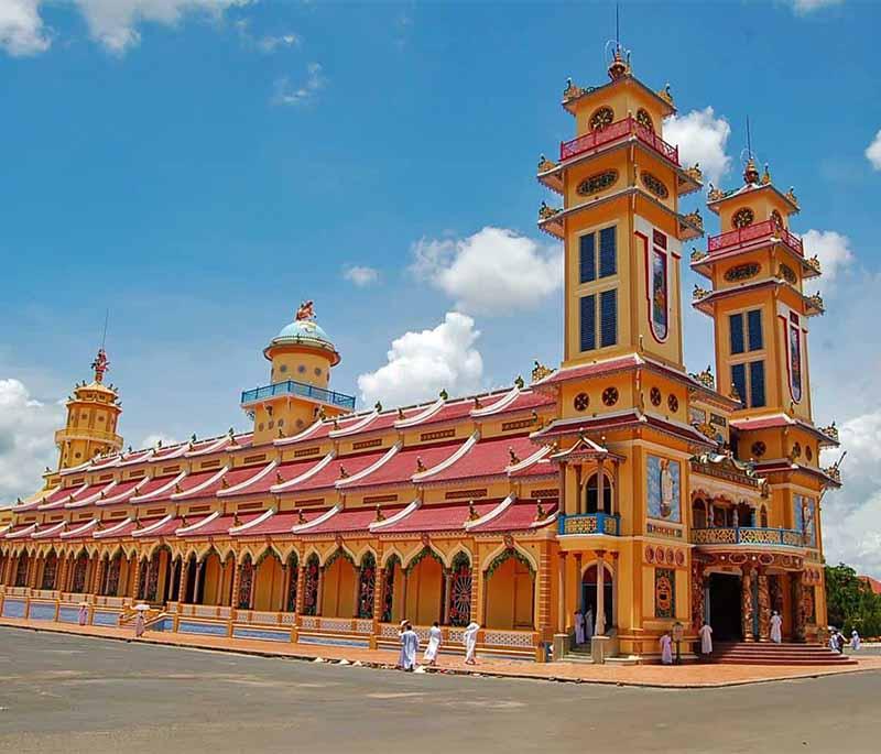 Cao Dai Temple - A colorful and unique temple in Tay Ninh, representing the Cao Dai religion, and vibrant festivals.