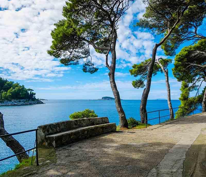 Cavtat, a charming coastal town near Dubrovnik, known for its beautiful harbor, historic sites, and vibrant art scene.