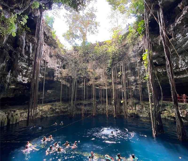 Cenote Oxman, Yucatan - Lesser-known but stunning cenote with a rope swing, perfect for adventurous swimmers.