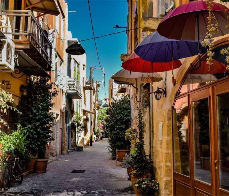 Chania Old Town, a historic area in Crete, featuring narrow streets, Venetian architecture, and a harbor.