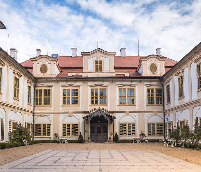 Chateau Loucen, a charming chateau with beautifully landscaped gardens, a maze, rich history, and scenic views.