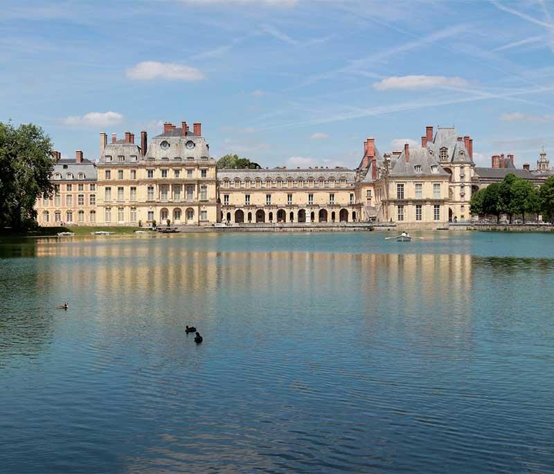 Château de Fontainebleau, Fontainebleau, a former royal residence with beautiful architecture, gardens, and rich history.