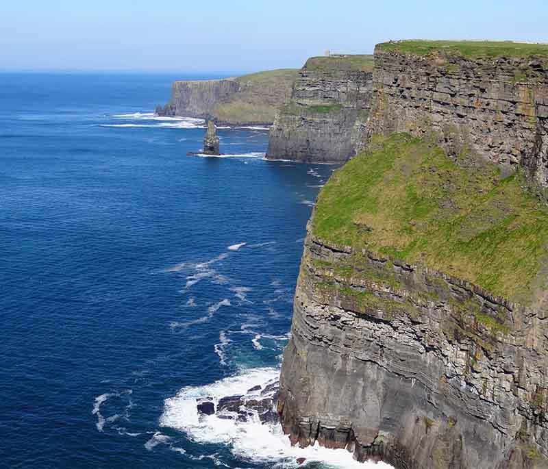 Cliffs of Moher, towering sea cliffs on the west coast of Ireland, offering breathtaking views of the Atlantic Ocean.