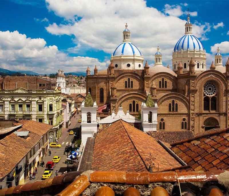 Cuenca's Historic Center, featuring beautiful colonial buildings, cobblestone streets, and the famous blue-domed cathedral.