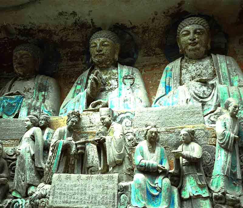 Dazu Rock Carvings in Chongqing represent a stunning collection of religious sculptures and carvings from the 7th century.