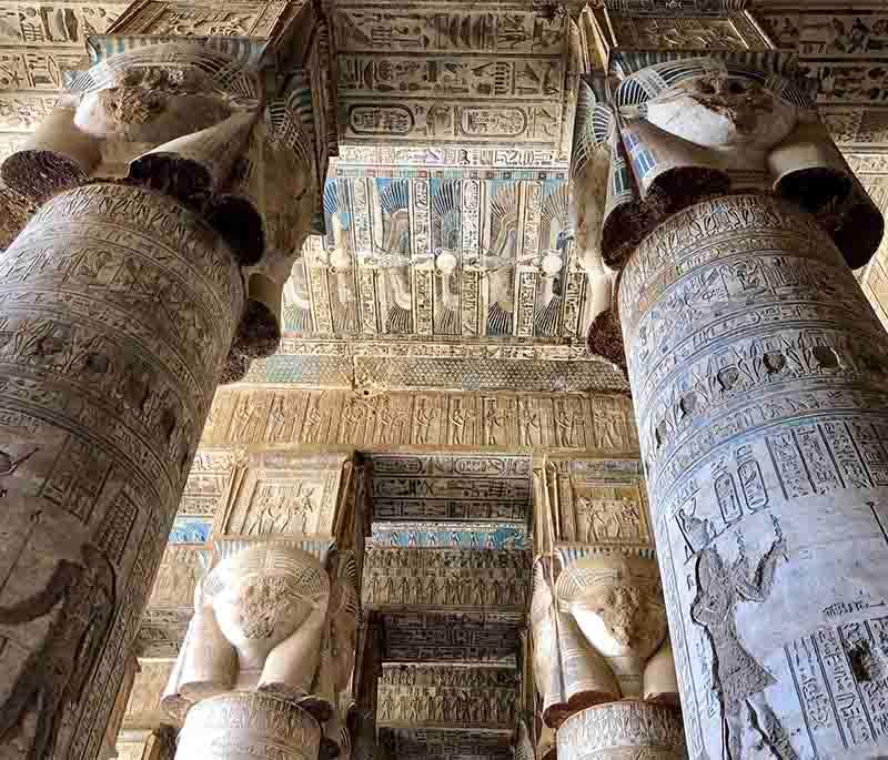 Dendera Temple Complex, a well-preserved temple dedicated to Hathor, featuring vibrant reliefs and the Dendera Zodiac.