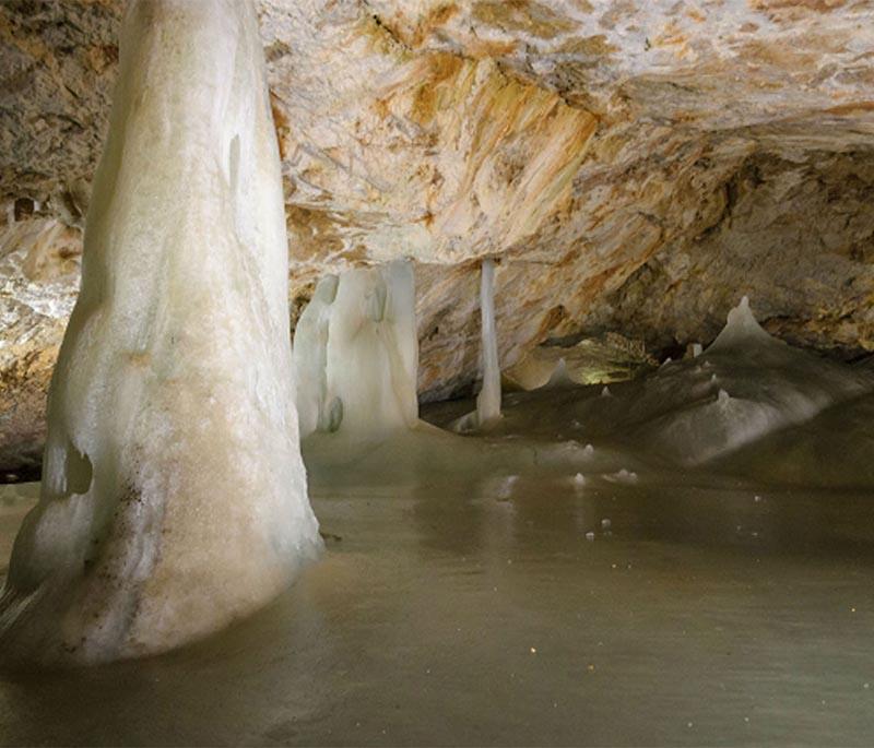 Dobšinska Ice Cave - A unique cave with spectacular ice formations, part of the Slovak Karst National Park and a UNESCO site.