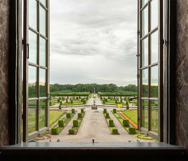 Drottningholm Palace - UNESCO royal residence, rich heritage, landscaped gardens, and Baroque architecture.