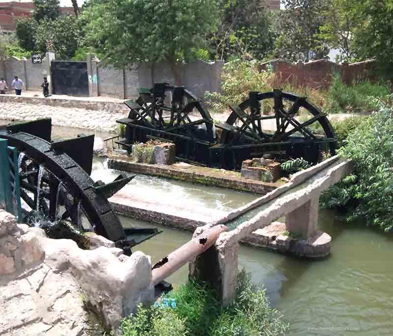 El-Fayoum Waterwheels, ancient irrigation tools in Faiyum Oasis, showcasing Egypt's agricultural history.