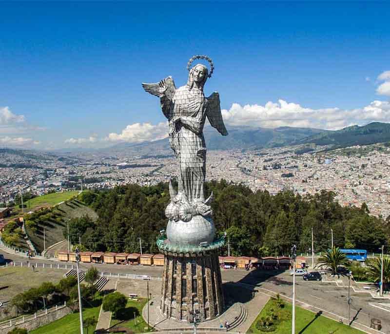 El Panecillo in Quito, a hilltop viewpoint featuring a statue of the Virgin Mary and offering panoramic views of the city.