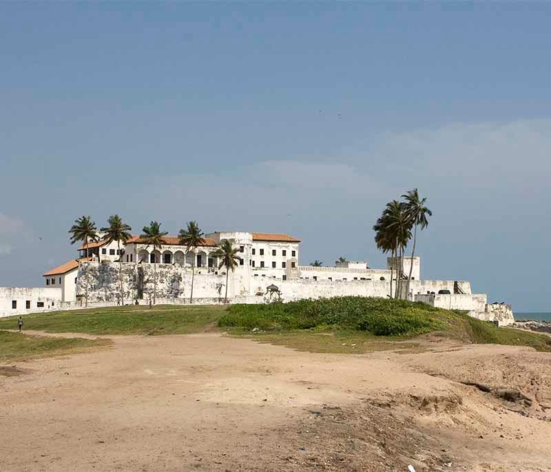 Elmina Castle, a UNESCO World Heritage site and one of the oldest European buildings, significant in the slave trade history.