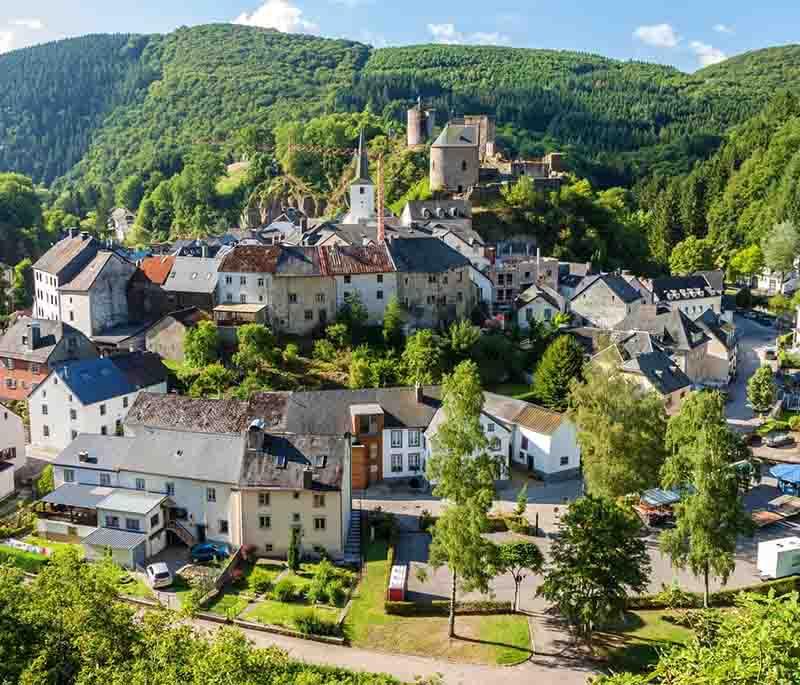 Esch-sur-Sûre, a picturesque village known for its historic castle ruins and beautiful setting along the Sûre River.