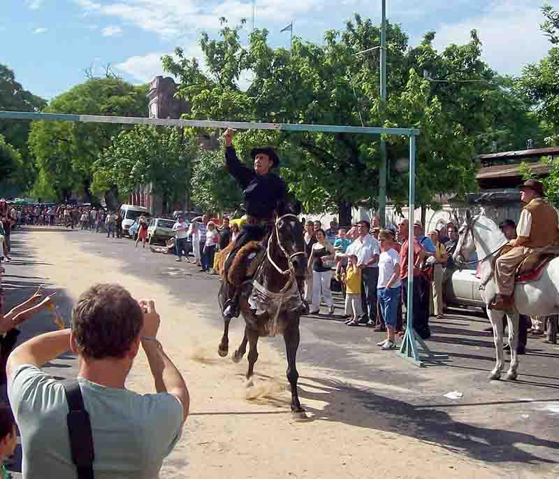 Feria de Mataderos, Buenos Aires: Traditional folk dancing, artisan crafts, and local cuisine at a vibrant street market.