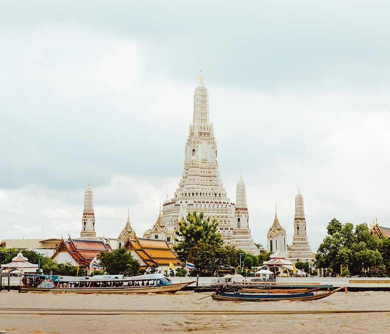 Floating Markets, Bangkok - Famous markets where vendors sell goods from boats, offering a unique shopping experience.